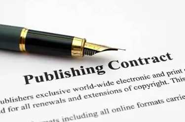 Music publishing contract on table with pen